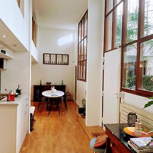 Loft With View On A Quiet Garden, Parisian Charm
